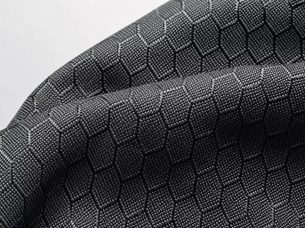 Macro photo: 0.25mm TPU lamination bonded to 210D ripstop nylon weave