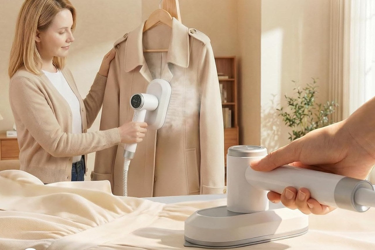 Steaming a wool coat on a hanger with the handheld steam head
