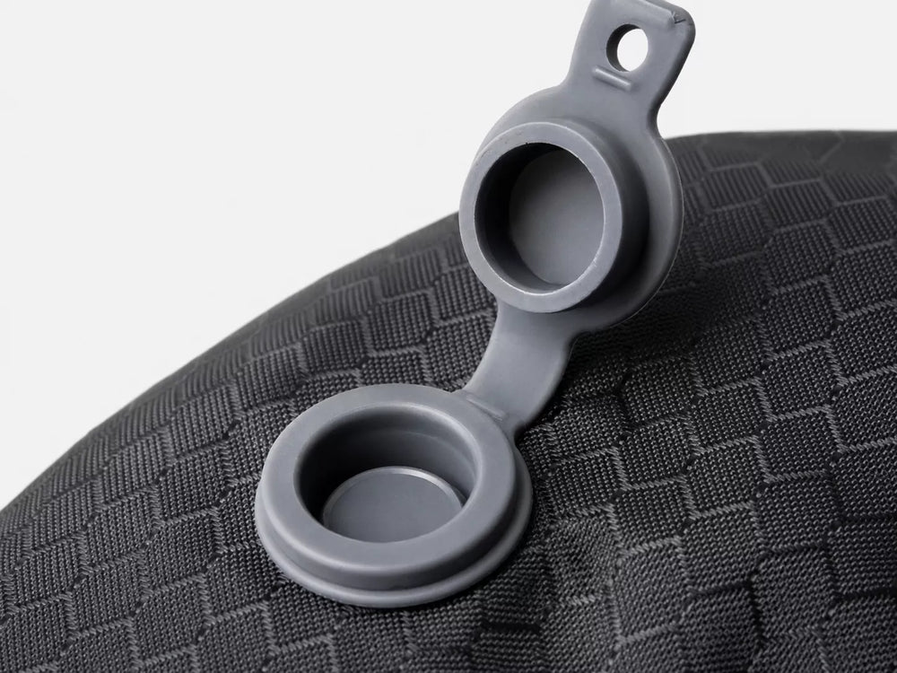 Macro photo: mushroom-cap silicone one-way valve closeup — no pump needed