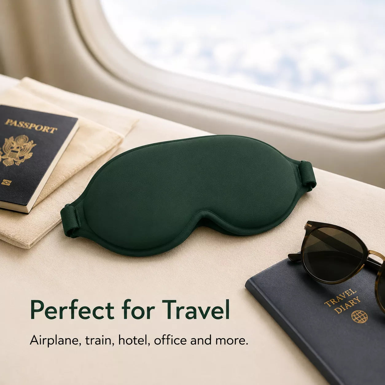 WellMall sleep mask packed for travel with passport and sunglasses