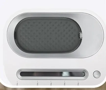 The textured anti-scald silicone pad on the base of the unit
